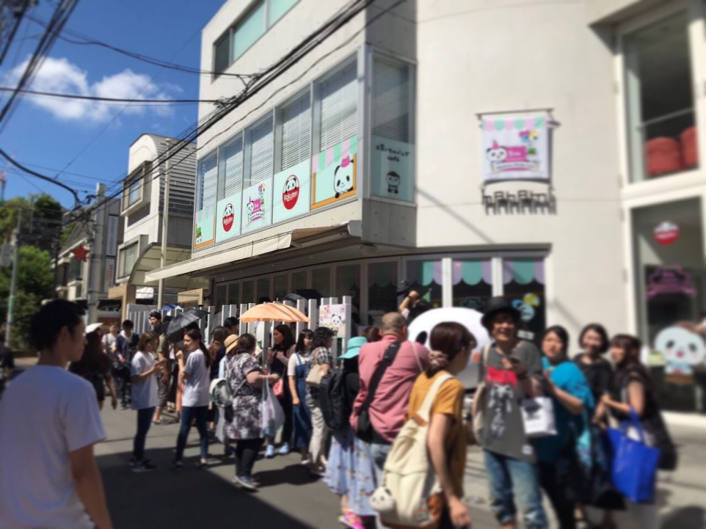 Ahead of opening, shoppers in Omotesando were queuing to take selfies with the Okaimono Panda on the street.