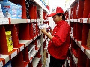 A Rakubin courier collecting products for an order