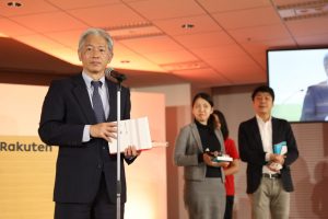 Koichi Takeda, a member of the IBM Watson team, speaks after receiving the Gold Prize at the Rakuten Technology Conference 2016.