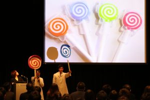 The Ishikawa Prefectural Kanazawa Commercial High School team making their presentation.
