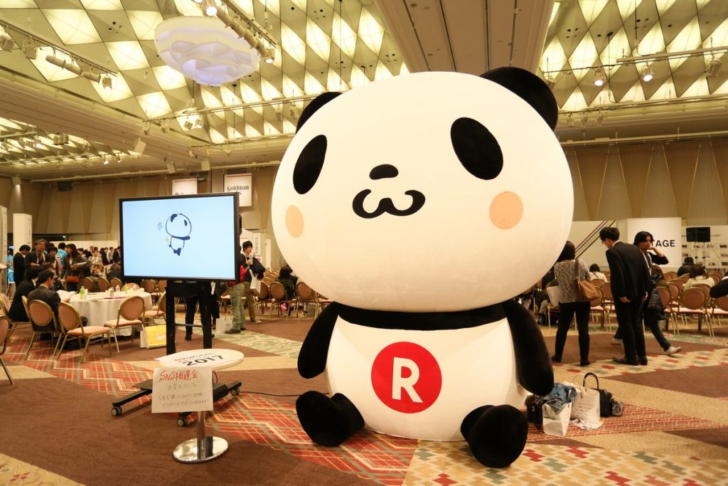 The enormous Rakuten Panda mascot dwarfed everyone and everything in the hall.