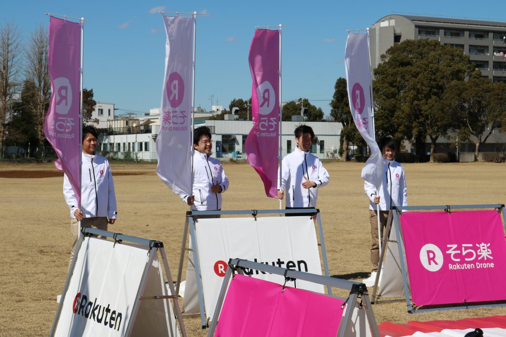 Strong winds meant extra help was required to keep the landing area flags upright.