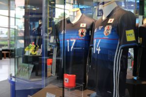 Japan's national football squad shirts on display at the museum.