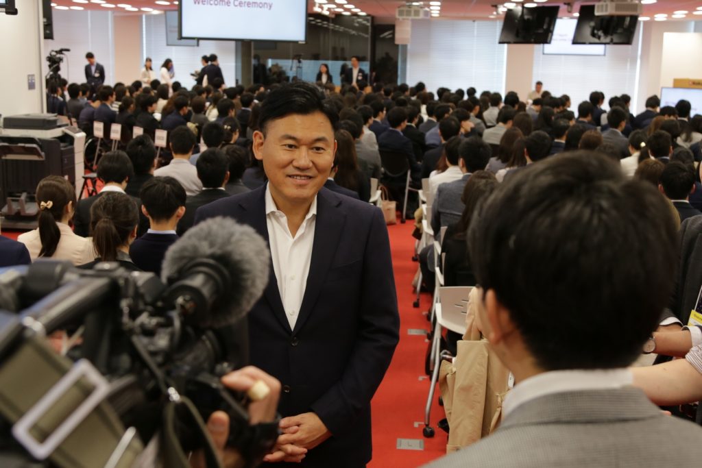 The beginning of the financial year (April 1) is also the traditional season for welcoming new university graduates to Japanese corporate life, and local media come out to cover the day's events.
