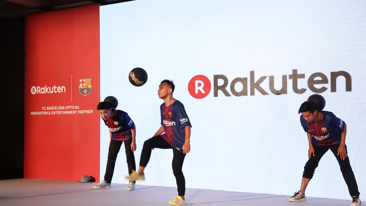 Performers showed off their lifting skills at the event to celebrate Rakuten's five years in Asia and its new partnership with FC Barcelona.