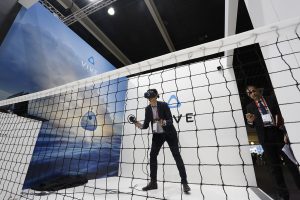 the Vive booth two men wearing headsets played a vigorous game of table tennis without a table.
