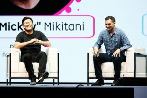 Rakuten CEO Hiroshi "Mickey" Mikitani sharing a laugh with Lyft President and Co-founder John Zimmer.