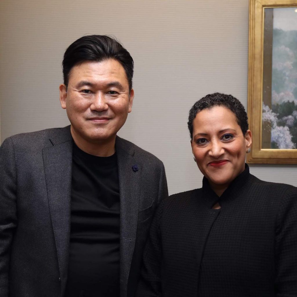Mickey Mikitani (left) with Harvard Business School Professor Tsedal Neeley during a recent visit to Tokyo, where she spoke to Rakuten employees and highlighted the importance of securing buy-in when driving any large-scale transformative change within an organization.