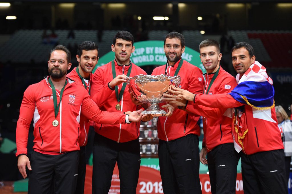 The Croatian team holding up the Davis Cup after winning the tournament in 2018.