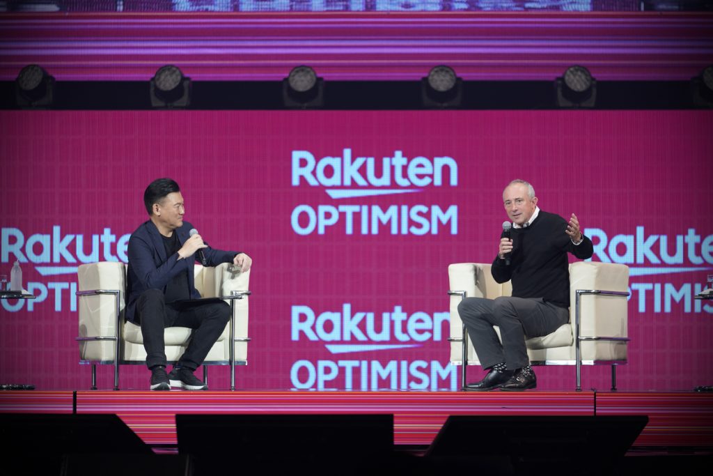 Agus (right) chats with Rakuten CEO Mickey Mikitani onstage.