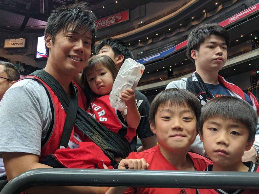 Hisashi and family waiting to greet their Toronto heroes.