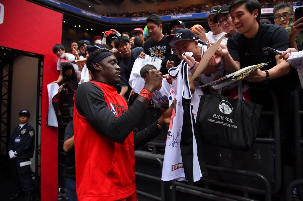 Pascal Siakam signing merch for lucky fans.