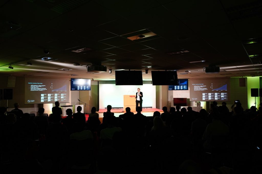 Machine Learning Tokyo (MLT) founder and director Suzana Ilic onstage at Rakuten Technology Conference 2019. MLT is a unique group focused on bringing diversity to AI.