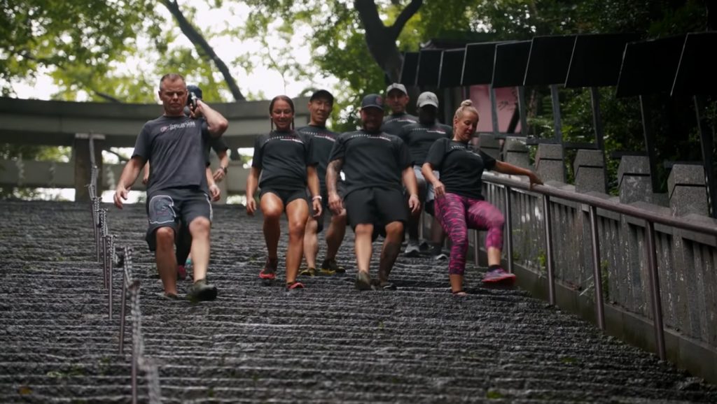 Led by Spartan CEO Joe De Sena, the group had to scale a flight of stairs known as the “stone steps to success” while carrying a 40lb (18kg) kettlebell weight up and down.